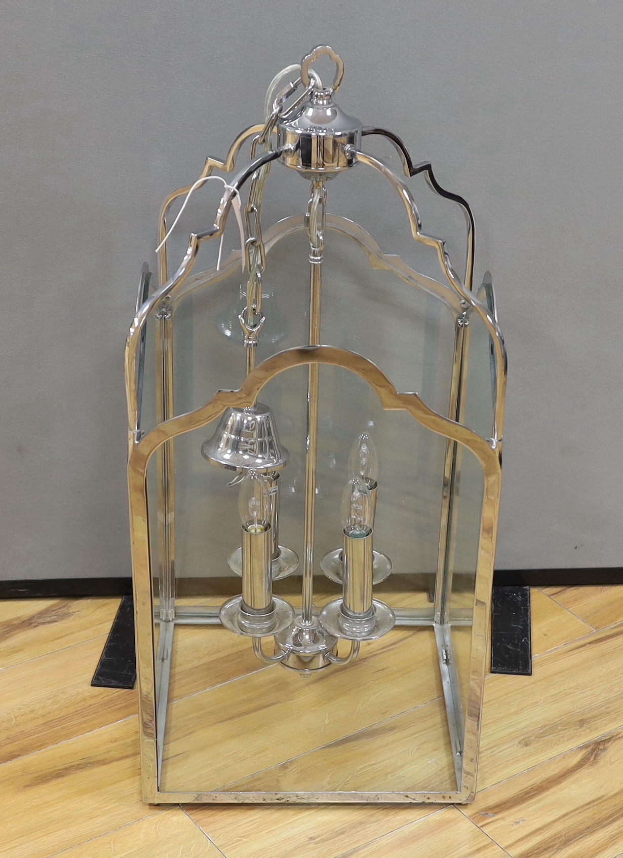 A chromium porch lantern, 76cm high excluding the fitting